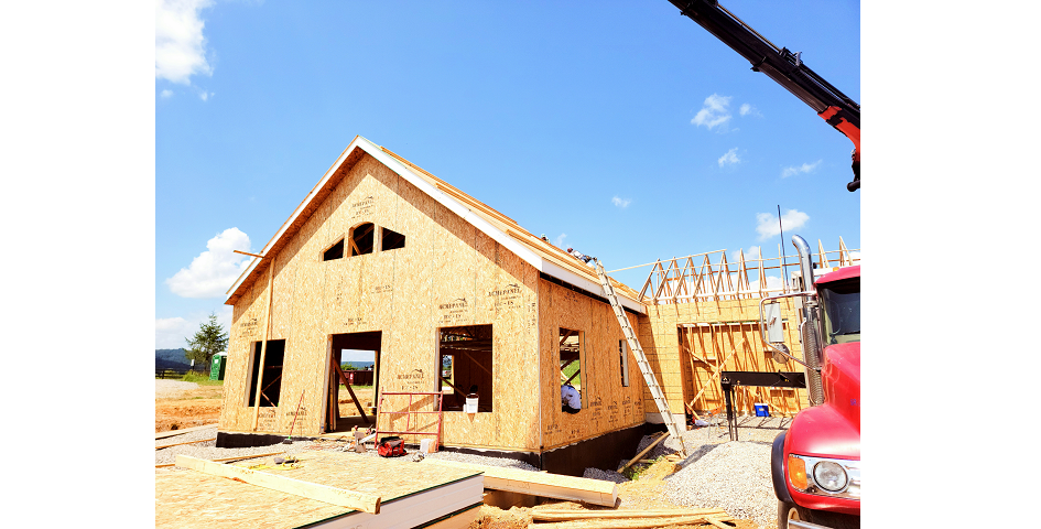 A completed farmhouse style home built with ACME panels