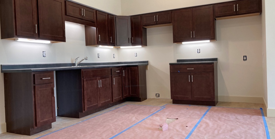 Interior kitchen of a completed apartment at Prices Fork Village